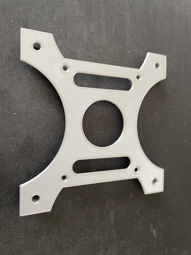 Flat bottom of the plate at an angle.